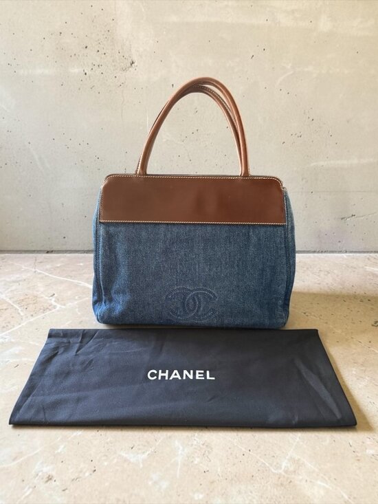CHANEL Handbags - Vintage Chanel Blue Denim CC Logo Tote Bag | Brown Leather Trim